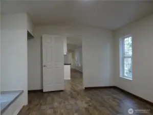 Primary Bedroom With Two Full-sized Closets. Looking back to Living Room Area.