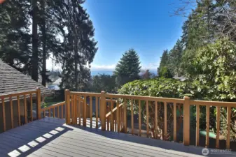 Facing West, there are views of the Sound, Olympic Mountains and Shipping Lanes from the front deck and Living Room Upstairs!