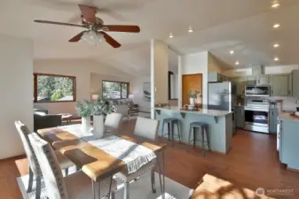 There is an eating bar and decent sized pantry closet.