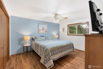 Primary bedroom with views to the private back yard