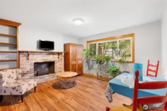 Lower living room with great light from large front yard.
