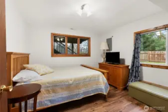 Lower level bedroom with views to the back yard.
