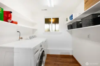 Laundry room with newer appliances