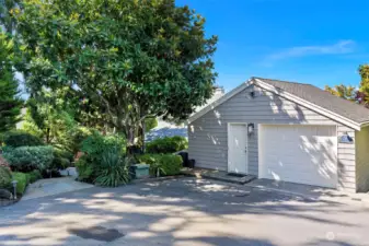 Plenty of parking just above the home. Pedestrian door leads to a 2nd office with views.