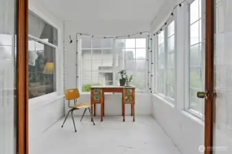 The porch with wrap around windows- lots of potential to add this sq footage to the living space.