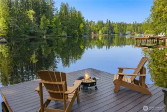 Stunning Sammamish lakefront living from your own private floating barge. Unwind on the dock as every weekend feels like a vacation.  Tour the lake and visit with friends and neighbors on your floating barge on Beaver Lake. Serene Sammamish waterfront retreat awaits with direct lake access.