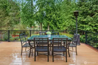 Dine al fresco on your elevated deck with views of Beaver Lake- the perfect setting for summer gatherings and tranquil mornings.