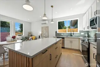 Gourmet kitchen with large island and quartz counters