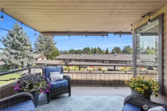 Spacious deck provides plenty of outdoor living area. Bonus - it has a gas grill hookup and the gas utility is included in the HOA!