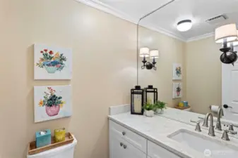 This powder room is conveniently located on the main level for guests and entertaining.