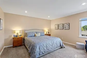 Catch peek views of the golf course from the primary bedroom.