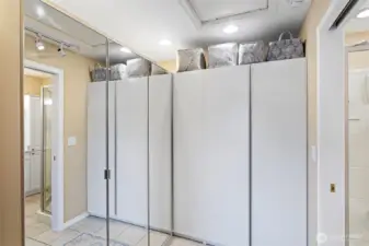 Two large closets flank the entry to the   en-suite bathroom.