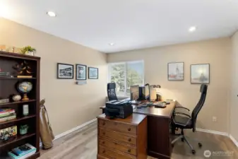 This unit's floorplan features a third, upper-level room that makes for a great home office.