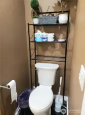 Another Close up view of the Primary Master Bath Room Showing New Toilet, Paint, Trim and Tile Flooring.