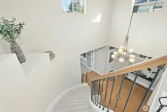 View from upstairs to high ceiling front entry