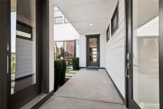 Entry into courtyard from front of home. Model Home pictures for illustration only. Colors and features may vary