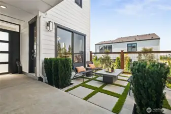 Courtyard looking back at entry and guest suite.  Model Home pictures for illustration only. Colors and features may vary