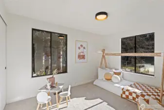 3rd main floor bedroom features large double closet and wall-to-wall carpeting.  It faces south and east overlooking front yard and neighboring park.