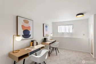 Lower level bedroom is freshly painted with new wall-to-wall carpet.