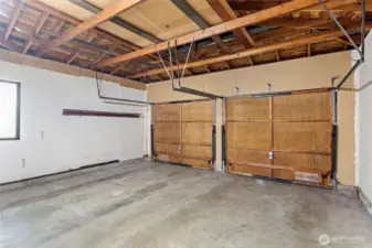 A two car attached garage completes the picture.