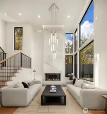 A grand two-story entry sets the tone with soaring ceilings and a striking DaVinci fireplace — an artful welcome that instantly feels like home.