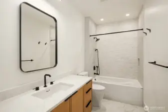 Hallway full bathroom completes the lower level.