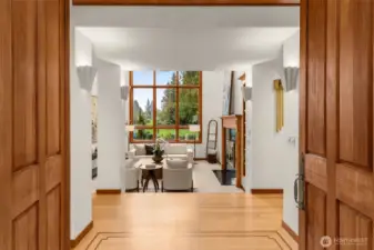 Step into this grand entry with custom built 10 foot vertical grain fir double doors.