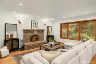 Cozy up at the fire in the living room.