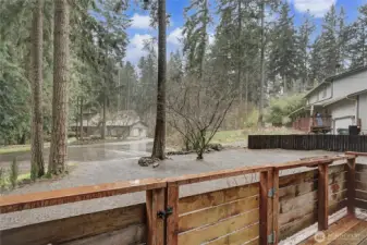 View from your front porch to your parking area and cul-de-sac. Porch is conveniently fenced-in with gate for kiddos and pets.