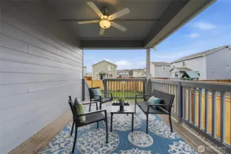 Enjoy outdoor living with the covered deck, overhead fan included to keep cool on warm summer evenings.