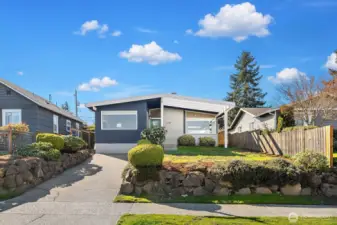 Elevated from street level in the front. You'll have ample off street parking in the long driveway in front as well as parking for multiple vehicles including space for an RV in the back.