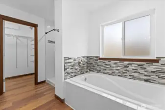 Soaking tub and walk-in shower.