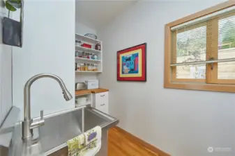 Don't miss the new pantry in the laundry room. Deep utility sink is a bonus!