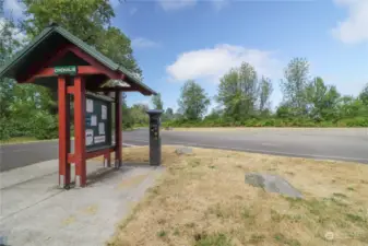 Trailhead parking and bathroom across street from lake.