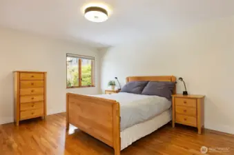 Super spacious bedroom with custom closets.