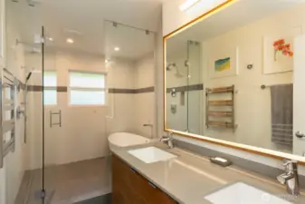 Luxuriously updated main bath with heated floors and soaking tub.