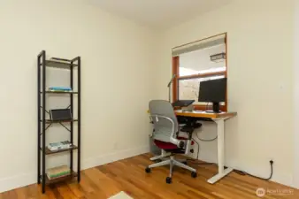 Second main floor bedroom also makes a perfect office.