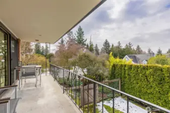 Expansive living room balcony, with room for dining or lounging while taking in the views.