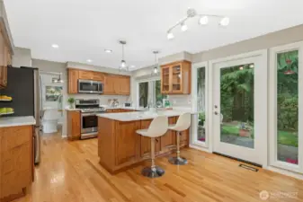 Informal breakfast nook eating area with a French door leading to the backyard area.