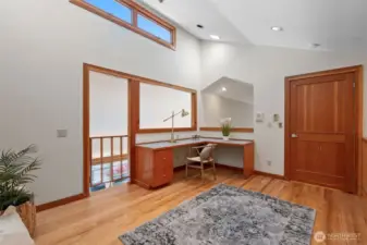 Upper level loft/office/library with elevator access.