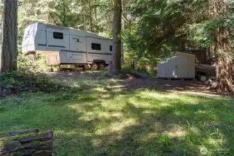 Artic Fox 5th wheel and storage shed included in sale.