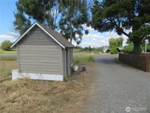 Small outbuiliding to the immediate right of the driveway as you enter.