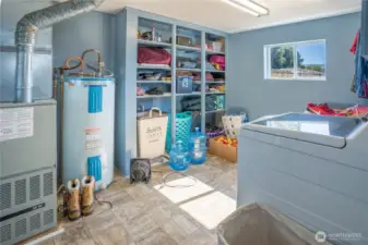 Picture here of the larger utility/laundry room.  Good storage shown here.
