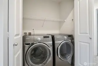 Laundry on top floor with next to primary suite.
