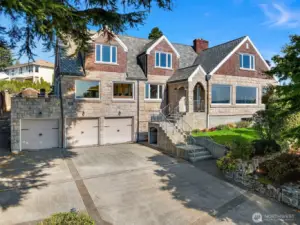Privately gated estate home with panoramic views of Commencement Bay, City lights of Tacoma & Mt Rainier