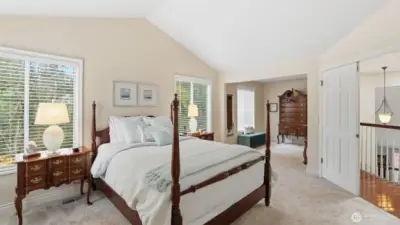 A wonderful benefit in the suite is a semi separate sitting room that is perfect for a den or craft room.