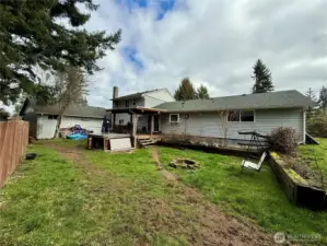 105 Timberline Dr, Castle Rock WA approx. half an acre, fenced, garden space, fruit trees, covered deck, fire pit