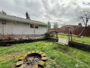 105 Timberline Dr, Castle Rock WA approx. half an acre, fenced, garden space, fruit trees, covered deck, fire pit