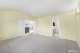 Double doors leading into the spacious primary suite.