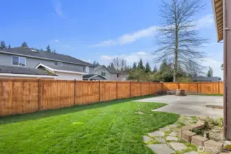 Fully fenced and low maintenance backyard.
